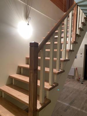 Выбор оптимальной деревянной лестницы для дома